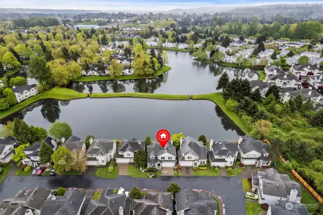This is the overhead view of the house situated on the high bank of Island Lake at The Lakes, in the gated "Lakeside at Cypress Cove" community.