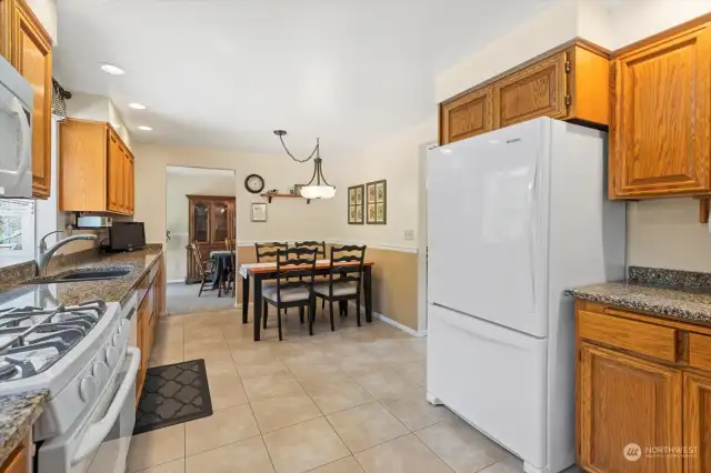 Gas range, newer appliances, tiled flooring with abundant cabinetry and counter space for the chef in your life!