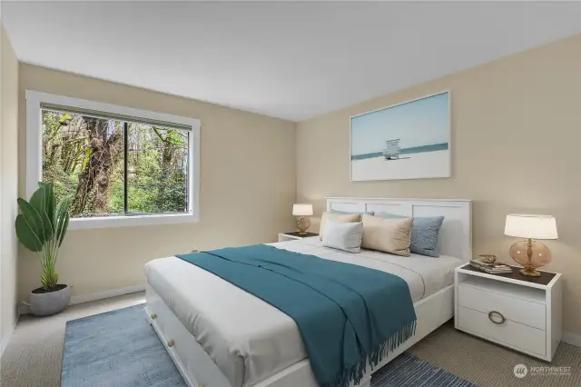 The second bedroom on the south end faces the greenbelt and the 'magical' tree. You'll have to see it! You can also see and hear the creek! Very serene!