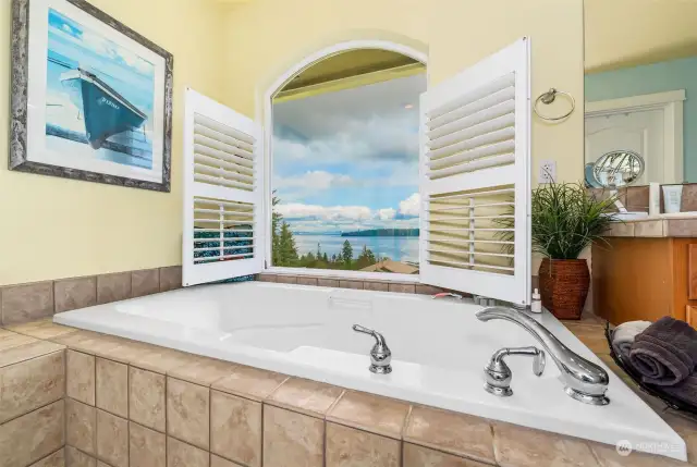 Imagine this view from the primary bathroom's soaking tub!