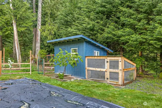 The veggie garden has been covered until you are ready to plant things and the chicken coop is ready for your hens.