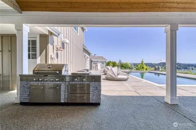 Also under the covered outdoor living space, outdoor grilling is yours complete with a Mt Rainier view!