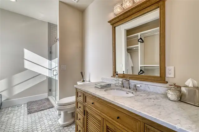 Details abound in every room, and this Jr en-suite bath is no exception—Thoughtfully elegant.