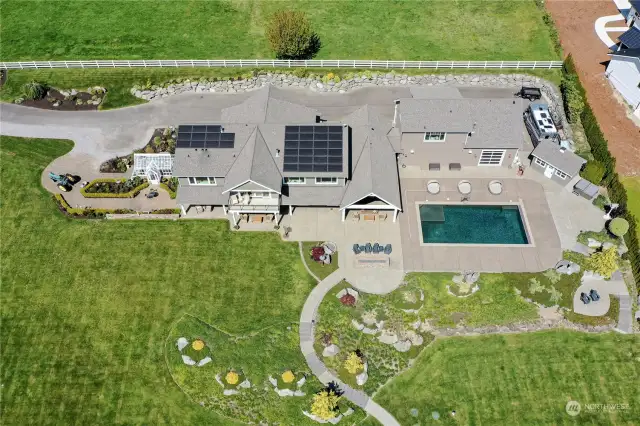This top down view gives you a great perspective on layout. And yes, those are solar panels on the roof to take advantage of the Southern orientation. Along with the private well, these solar panels make this property surprisingly low cost to operate.