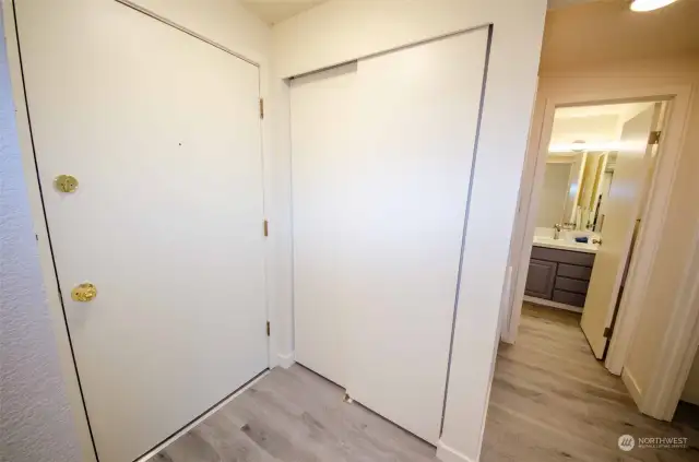 Entry and hall closet (water heater in back)