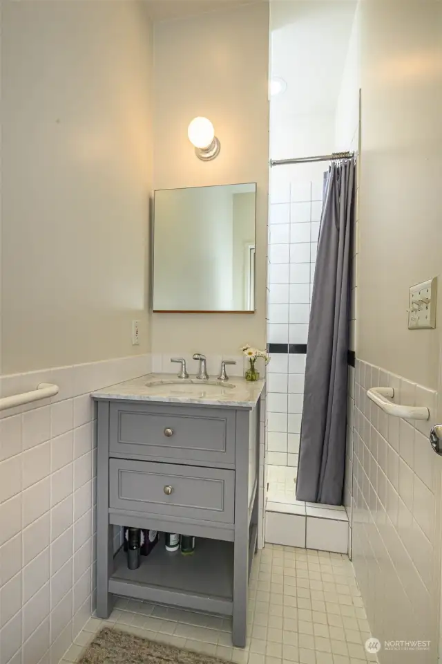 2nd bedroom 3/4 bathroom w/ new vanity, sink and fixtures