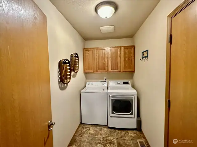 Laundry room with cabinet space...washer and dryer are included!