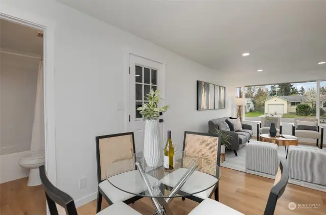 The dining room connects seamlessly with the living room.