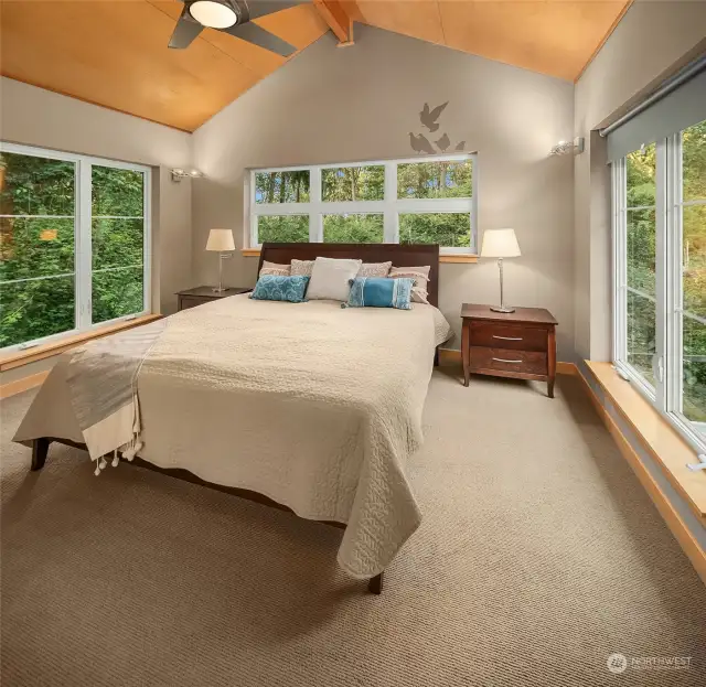 Large upstairs bedroom #3. Plenty of windows to take in the green views.