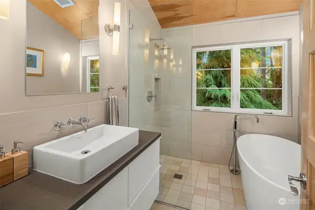 Full upstairs bathroom. Heated ceramic tile floor, tub with shower handset and glass walk-in shower.