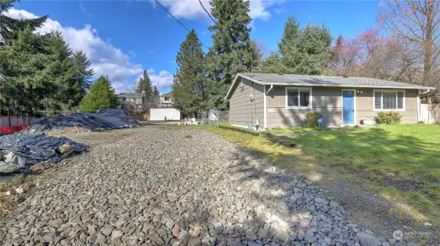 This portion of the driveway belongs to the existing home and offers ample parking.