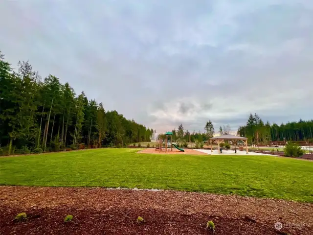 Poulsbo's newest neighborhood - Glennwood is a welcoming wooded oasis that you can be proud to call home. Community amenities include wide meandering streets with walking paths/sidewalks on both sides, trail access, common areas complete with reflection benches, a community park complete with picnic tables and pergola, play ground, gorgeous lush landscaping, and frisbee golf!