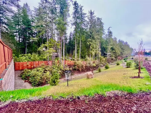 Poulsbo's newest neighborhood - Glennwood is a welcoming wooded oasis that you can be proud to call home. Community amenities include wide meandering streets with walking paths/sidewalks on both sides, trail access, common areas complete with reflection benches, a community park complete with picnic tables and pergola, play ground, gorgeous lush landscaping, and frisbee golf!