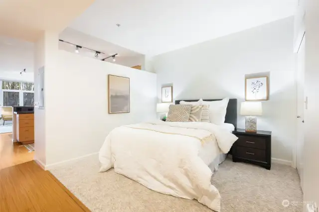 The bedroom is large enough to accommodate a king-sized bed.