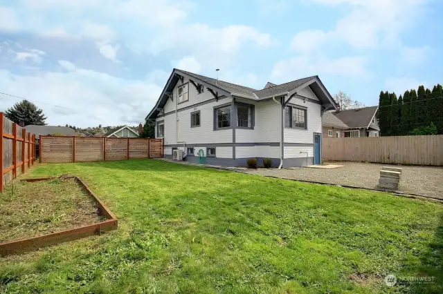 Huge, level yard with garden space.