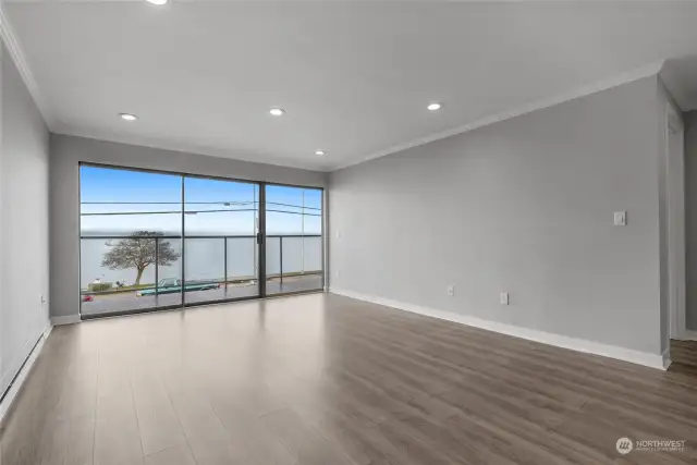 Expansive views from the living room. Step through the sliding doors onto your private deck.
