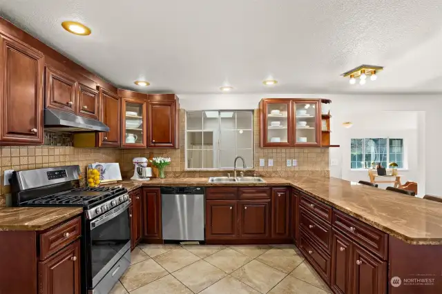 Incredible kitchen with SS appliances, quartz counters & plenty of storage.