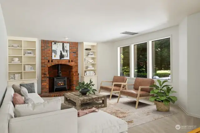 Family room with fireplace & large windows