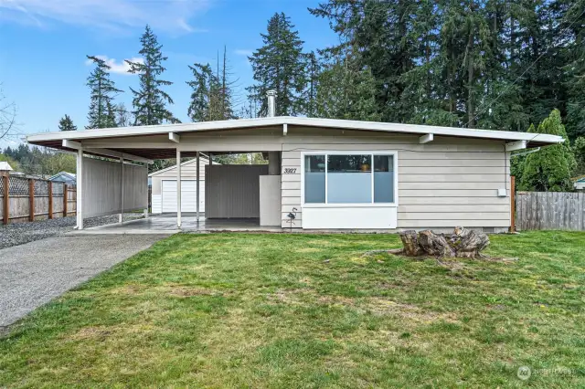 Easy living - one level mid-century home on oversized lot (.37 acres).