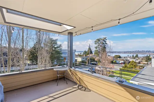 Upper Level Covered Balcony With Tremendous Views oO Lake Washington And The Olympic Mountains.