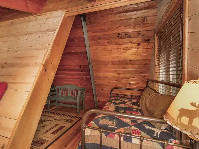 A total of 4 beds in the loft area.