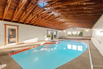Indoor in ground pool with hot tub