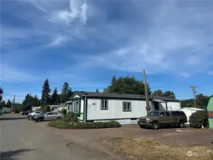 Currently a mobile home park, 9 spaces w/ 8 homes owned (1 outside owner).