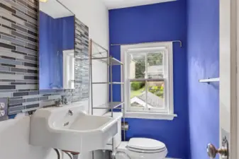 This is the half bath that is upstairs off the blue bedroom.