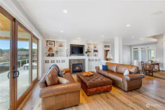 Solid wood floors, ample lighting, solid wood encased sliding glass doors. Quality throughout!