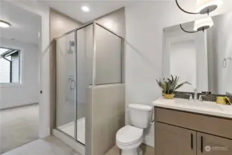 Main level 3/4 bath with attached bedroom.