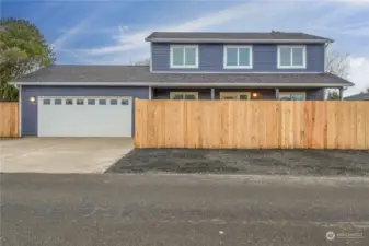 Front View of home with Privacy Fence