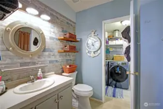 Primary Bathroom with Shower and walk through to Laundry Room.