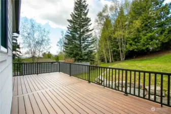 Seller added on this expansive back deck. Perfect for outdoor dining, grilling and entertaining.