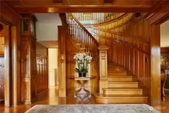 This majestic staircase was hand-crafted by master artisans from another time. It has been restored to the highest quality standard.
