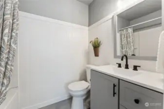 Private bathroom has been completely gutted and remodeled from top to bottom including opening a wall to create a full-sized tub and shower.