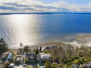 Rising up from Beach Drive, this property is perfectly sited to capture views while also being walkable to neighborhood parks & nearby amenities.