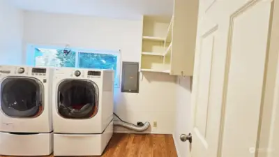 Huge laundry room and pantry. Easily reconfigure to add an additional bathroom.