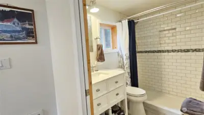 Main upstairs bathroom with large shower.