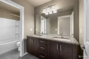Secondary/guest bathroom upstairs with dual sinks and a seperate bath/toilet room! Super convenient!
