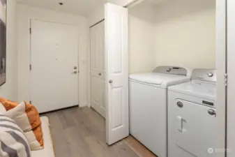 Full size washer/dryer and another large hall closet