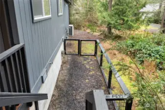 Dog run from back deck off family room.