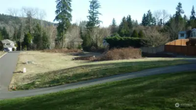 .33 acre North facing building lot. Awaiting your custom designed home. Local builder, Atera homes for your possible builder.