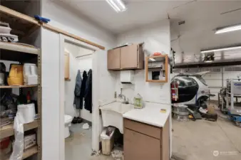 Bathroom and sink in detached garage.