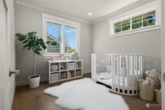 Here, the front bedroom is virtually-stage as a nursery, but at nearly 11x11 provides ample space for a queen. You’ll also find an over-sized walk-in closet with a window in this bedroom (see floor plans provided in listing photos and supplements available from your Realtor).