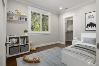 The back bedroom, with east light and green belt views, again provides ample space and a walk-in closet.