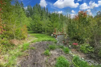Garden space, trails, and acreage to explore and enjoy.