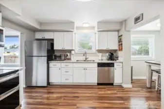 Large spacious kitchen with ample counter and cabinet space.  Great for entertaining.
