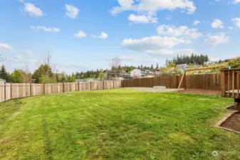 Play ball, run in circles, or garden. Light, bright, generous back yard with new cedar fence.
