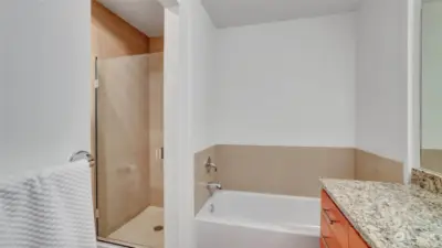 Bathroom include a tub & Shower.