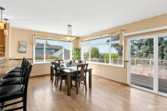 Dining room is very large and would accommodate huge table for entertaining.  Opens to the enormous deck.